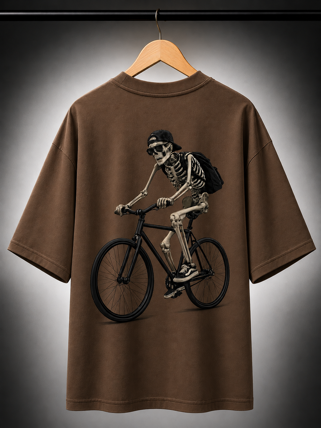 Skeleton riding bicycle oversized t shirt| pimbl Styles  — Brown 3